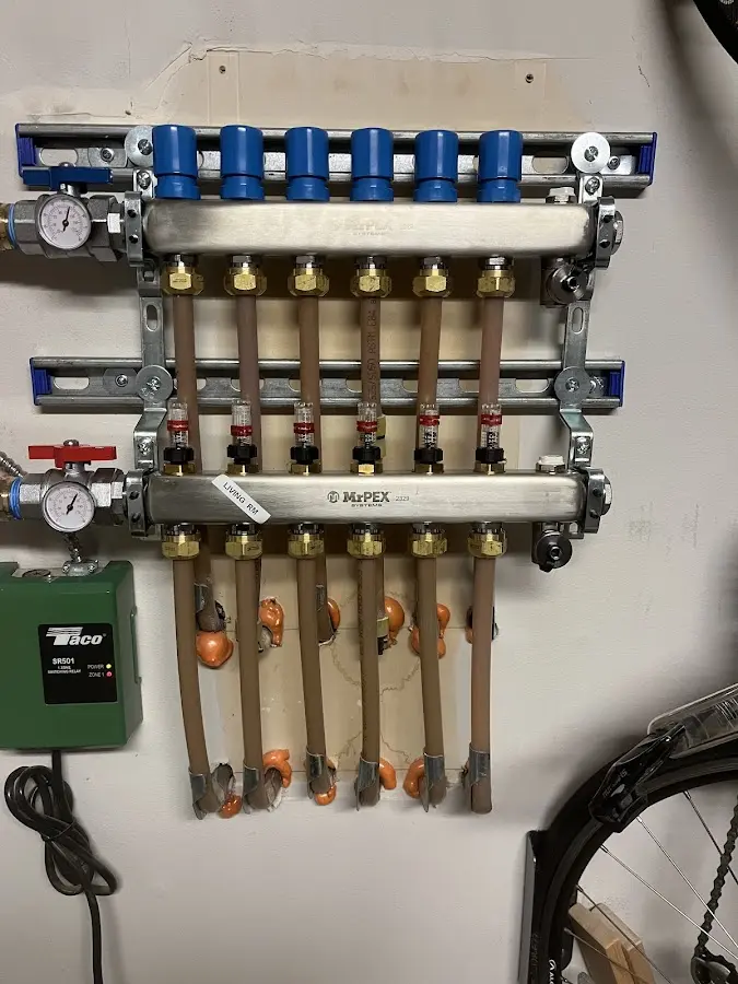 Plumber performing Gas Line Installation at a residential property in Janesville